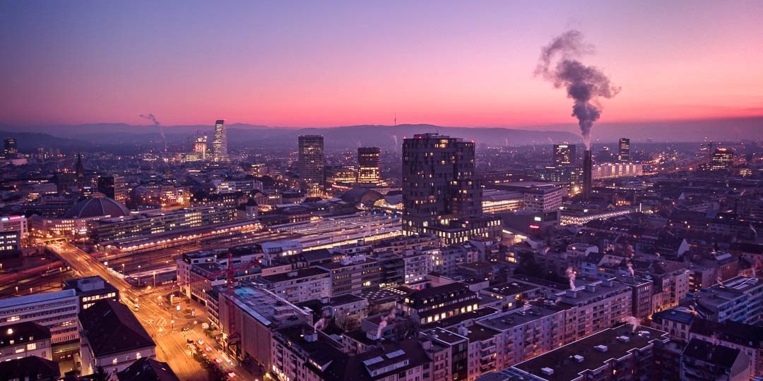 Dramatic Basel Cityscape at during blue hour at dawn