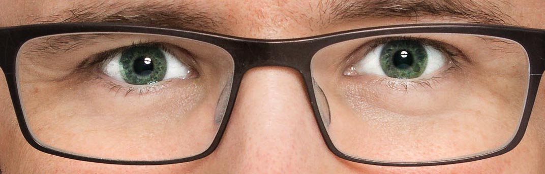 Image of a pair of eyes and glasses