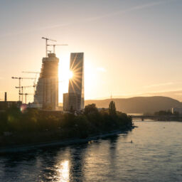 The sun peeking from behind Roche's building 1, forming a beautiful sunstar during sunrise