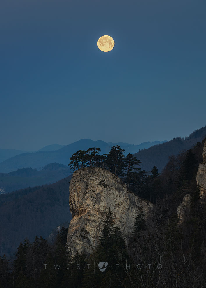 Nighttime Photograph showing the Supermoon 2021 over the Ankeballe in Baselland, Switzerland