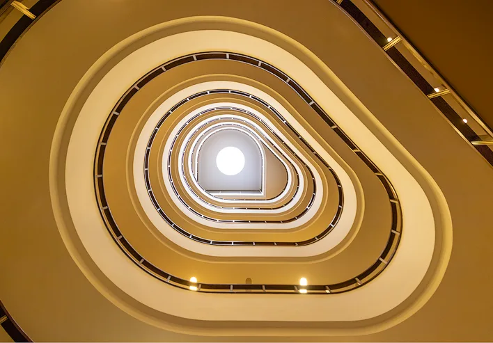 Abstract Architecture Photograph showing a pear shaped Staircase in a Hotel in Ljubljana
